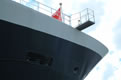 Photograph of the tip of the QE2's bow viewed from Bilbao's dockside