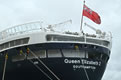 Photograph of the stern of QE2 docked in Stavanger in June 2008