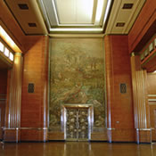 Painting by Philip Conrad and ornate bronze doors