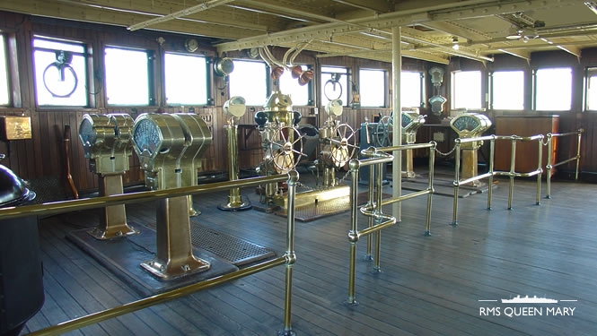 The bridge showing engine telegraphs and the ship's wheel