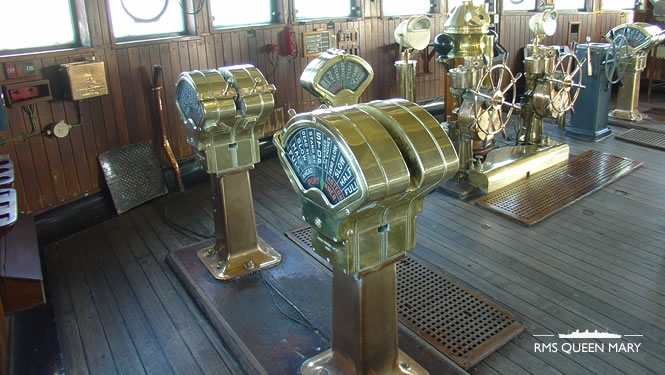 The bridge showing engine telegraphs and the ship's wheel